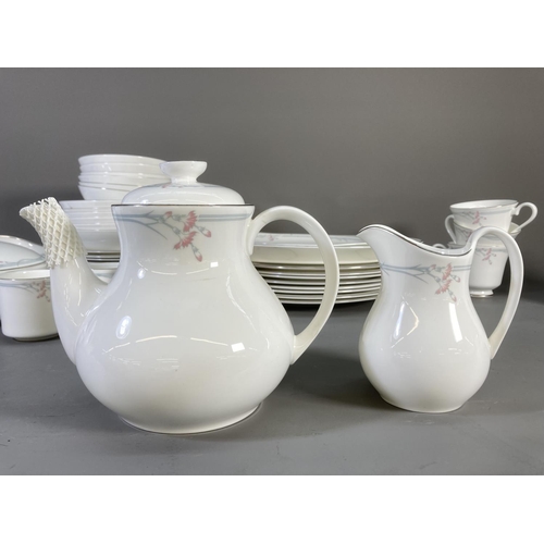 Approx. seventy pieces of Royal Doulton Carnation dinnerware comprising six tea cups, teapot, five c