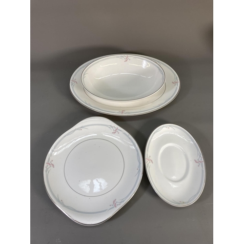 Approx. seventy pieces of Royal Doulton Carnation dinnerware comprising six tea cups, teapot, five c