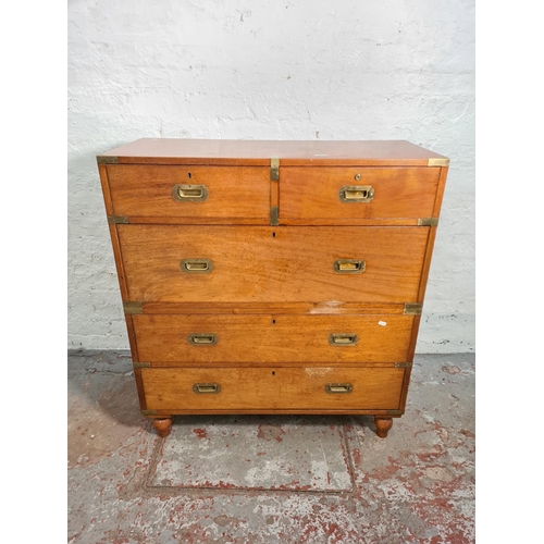 57 - An early 20th century mahogany and brass campaign chest of two short over three long drawers - appro... 