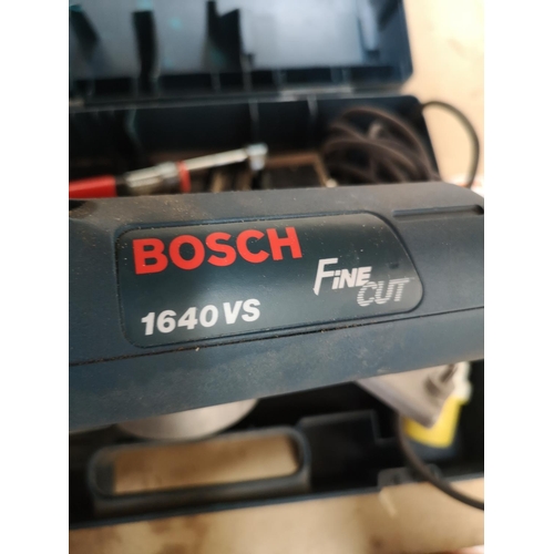 A cased Bosch Fine Cut saw with attachments, one FS2000 and one 1640VS