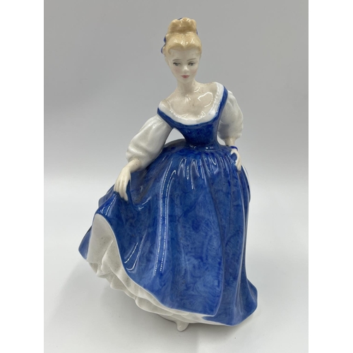 Three ceramic lady figurines, Royal Doulton Camellia HN2222, Royal