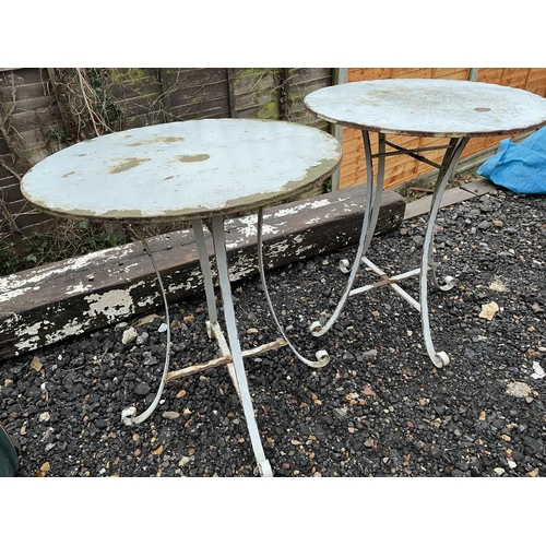 Two vintage metal bistro tables