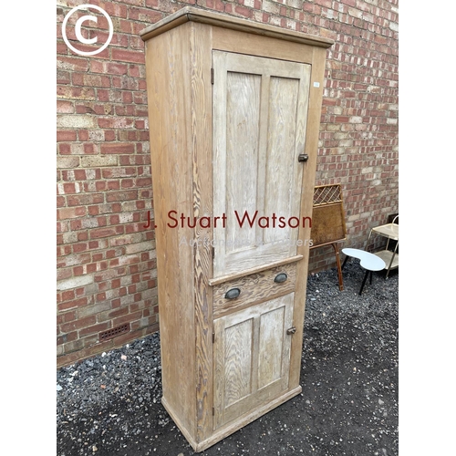 An antique pine larder cupboard with two cupboard doors and Barnebys