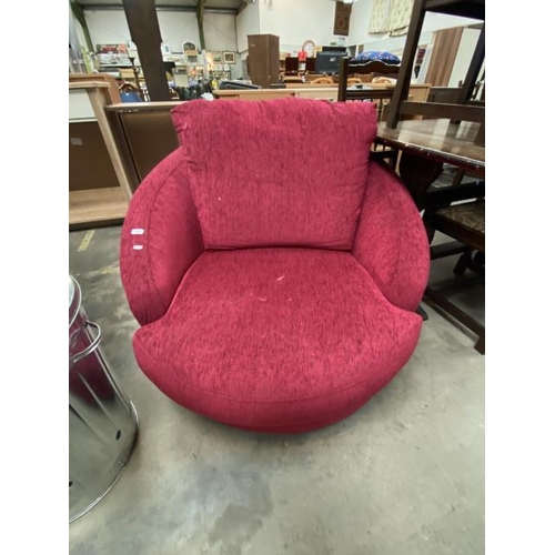 40 - Pink upholstered swivel cuddle chair