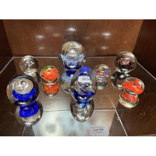 Collection of 8 glass paperweights