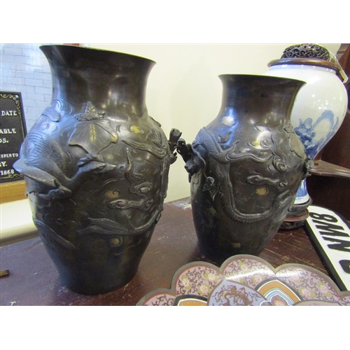 Two Antique Oriental Bronze Vases With Dragon Motif Decoration