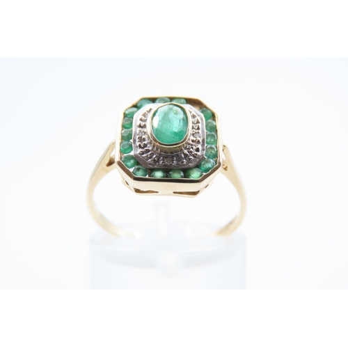 13 - Emerald and Diamond Ladies Panel Set Ring Mounted on 9 Carat Yellow Gold Ring Size O