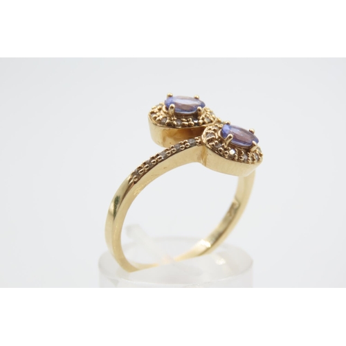 23 - Twin Stone Tanzanite and Diamond Crossover Ring Set on 14 Carat Yellow Gold Band Ring Size Q