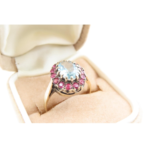 36 - Ruby and Aquamarine Ladies Cluster Ring Mounted on 9 Carat Yellow Gold Band Ring Size M