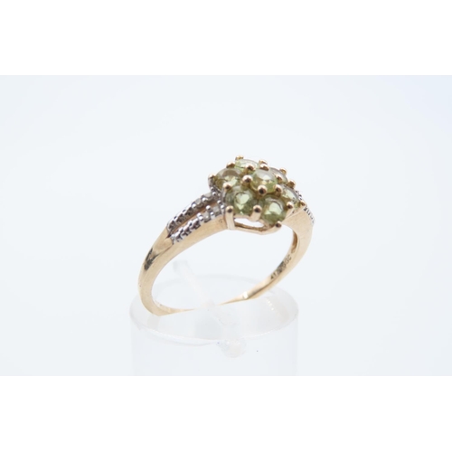 44 - Peridot and Diamond Ladies Cluster Ring Mounted on 9 Carat Yellow Gold Band Ring Size N