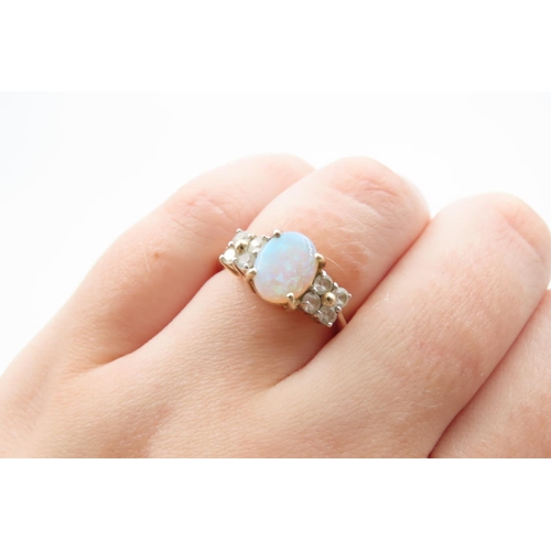 46 - 9 Carat Gold Opal and Gemset Ladies Centre Stone Ring Mounted on 9 Carat Yellow Gold Band Ring Size ... 