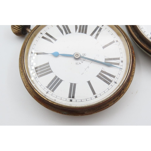 58 - Four Oversized Pocket Watches and Travel Watches The Largest 7cm Diameter