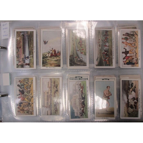 24 - Coln. of complete and part sporting sets, in an album, in variable cond., incl. Churchman Sports & G... 