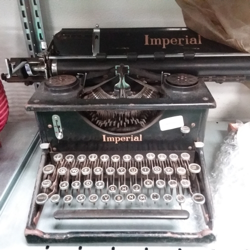 A vintage Imperial typewriter. | Barnebys