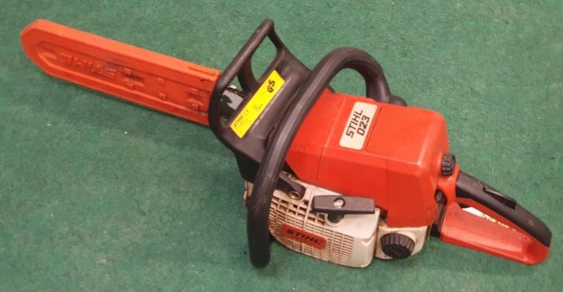 A Stihl 023 Chainsaw (REF 16).