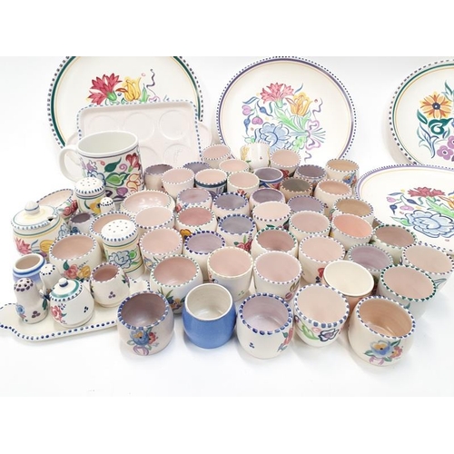 93 - Quantity of Traditional Poole Pottery to include cruet sets and plates.
