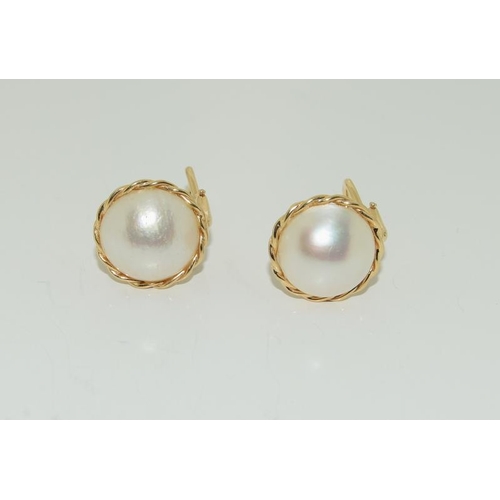 84 - 14ct Mabe Pearl Earrings.