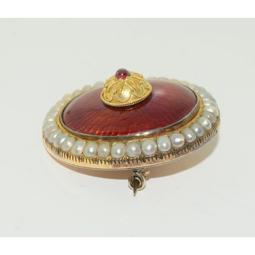 219 - Georgian Yellow Metal Enamel Brooch set with Pearls and a central Garnet.