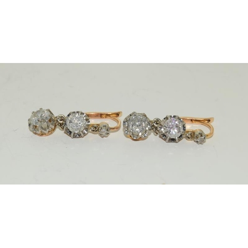 199 - Pair of Yellow Gold Graduated Diamond Drop Earrings, approx 3.1ct