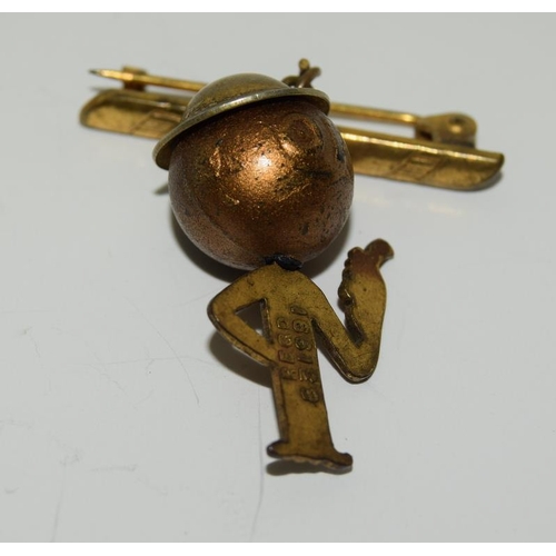 79 - Victorian yellow metal brooch and a brooch in the shape of a school boy.