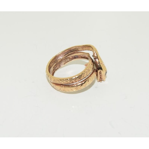 175 - 9ct Gold Snake ring 6.9gm, Size P.