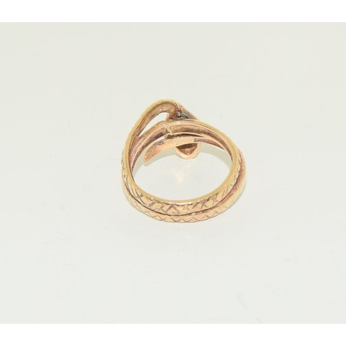 175 - 9ct Gold Snake ring 6.9gm, Size P.