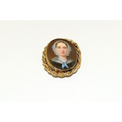 215 - An Antique Victorian hand painted miniature brooch.