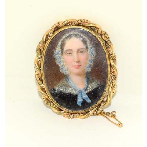 215 - An Antique Victorian hand painted miniature brooch.