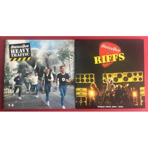 347 - STATUS QUO PROGRAMMES. 2 great tour programmes ‘Heavy Traffic and Riffs’. These programmes are origi... 