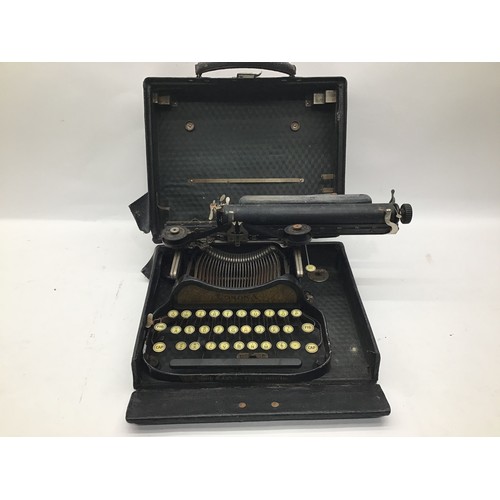 7 - Vintage L.C.Smith and Corona typewriter with original box and pair of glass small display cases
