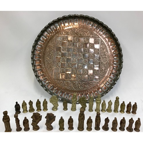 15 - Brass chess set complete with 32 figures. Tray size 46cm.