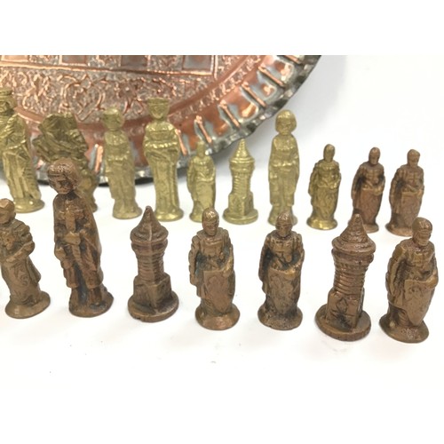 15 - Brass chess set complete with 32 figures. Tray size 46cm.