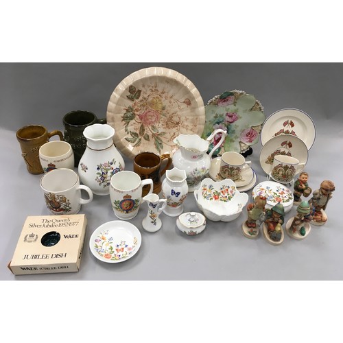 202 - A collection of miscellaneous china and pottery to include Hummel figures, commemorative wares, Ayns... 