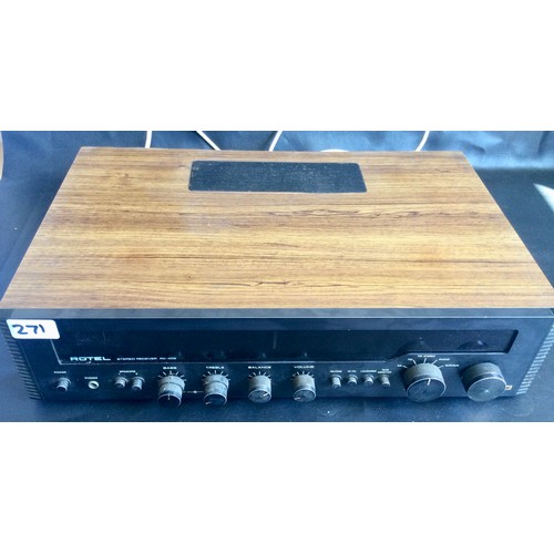 1204 - ROTEL RX-402 RECEIVER AMPLIFIER. Vintage stereo receiver amplifier with woodgrain case. Made in Japa... 