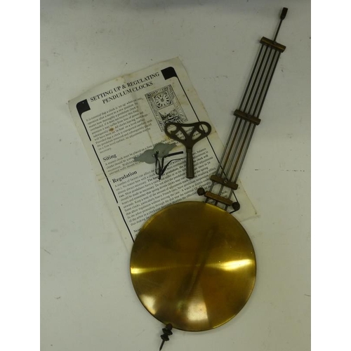 43 - Vintage Mahogany cased wall clock with pendulum