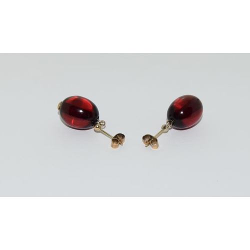44 - 9ct Victorian amber earrings.