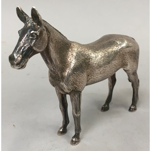 5 - Silver plated free standing model of a horse