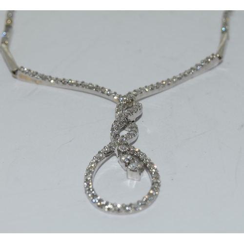 83 - 18ct white gold diamond drop necklace in the halo style