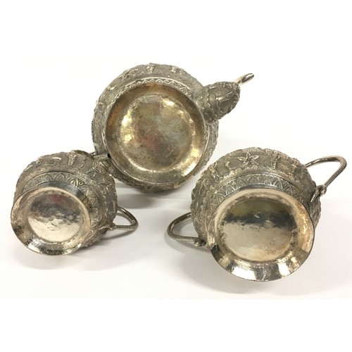 2 - Oriental silver embossed 3 piece tea set 885gm