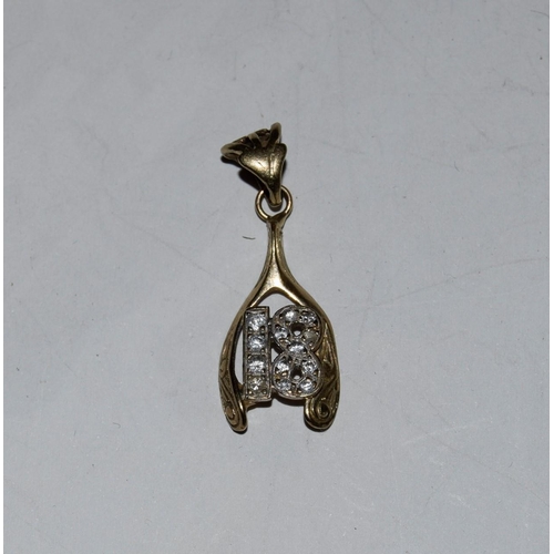 34 - 9ct gold diamante charm for 18 years old