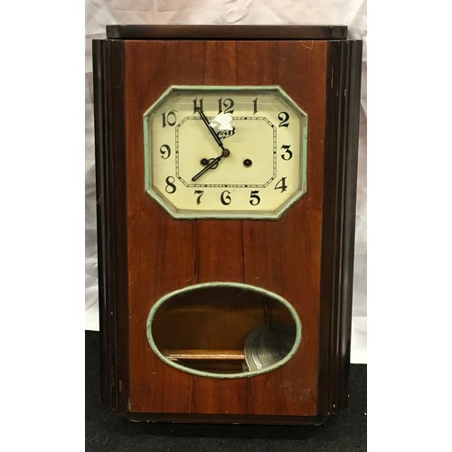 48 - Wooden framed striking pendulum wall clock