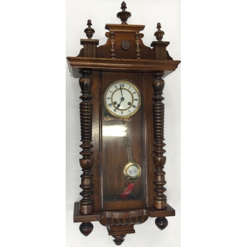 Mahogany chiming wall clock with key and pendulum | Barnebys