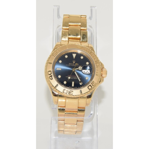 45 - Rolex Yachtmaster 18ct gold model 16628. Electric blue face with Rolex service card and boxed. (ref ... 