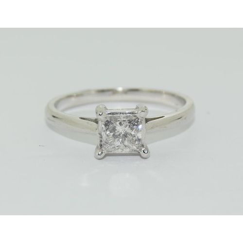 1075 - An 18ct white gold princess cut single stone diamond ring of approx 75 points. Size M