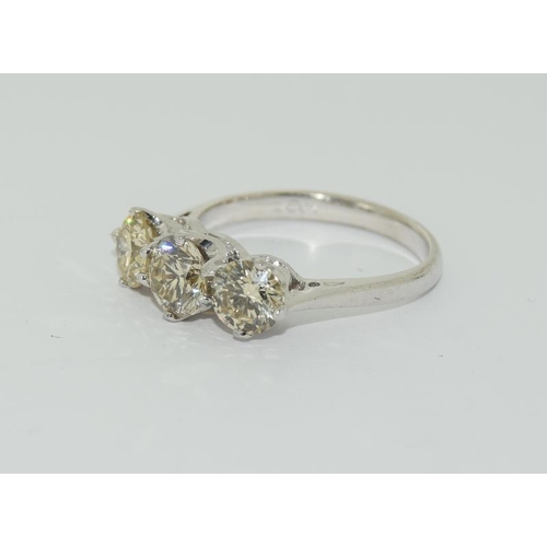 1083 - An 18ct white gold trilogy yellow diamond  ring of approx 1.9cts. Size K