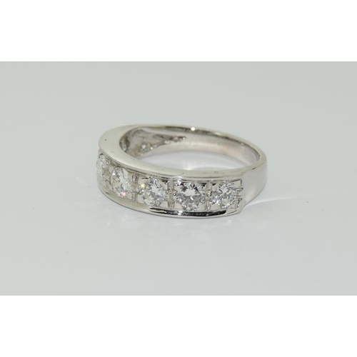 1088 - An 18ct white gold half eternity ring of approx  1.5cts. Size O