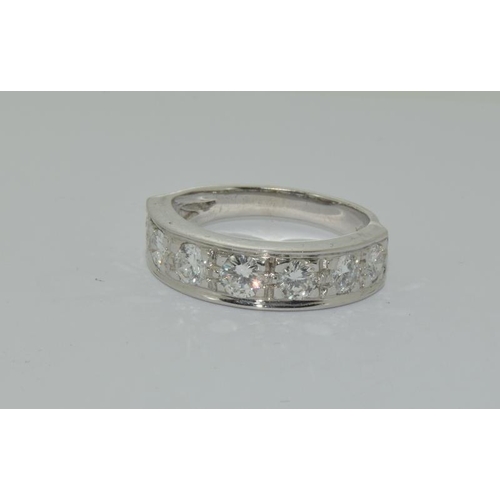 1088 - An 18ct white gold half eternity ring of approx  1.5cts. Size O