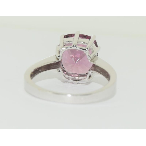 1094 - 18ct white gold Natural spinel 5.18 carats red/brown in colour, 4.4g weight with certificate. Size N