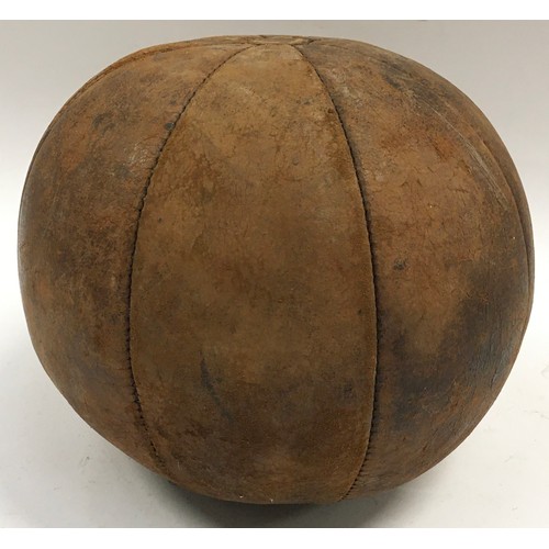 25 - Vintage leather medicine ball. Good condition with stitching intact