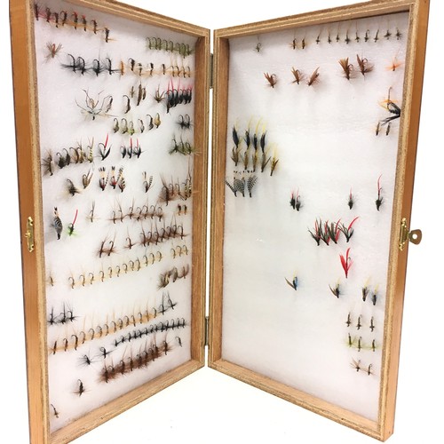10 - Comprehensive collection of fishing flies and leaders. A good quantity